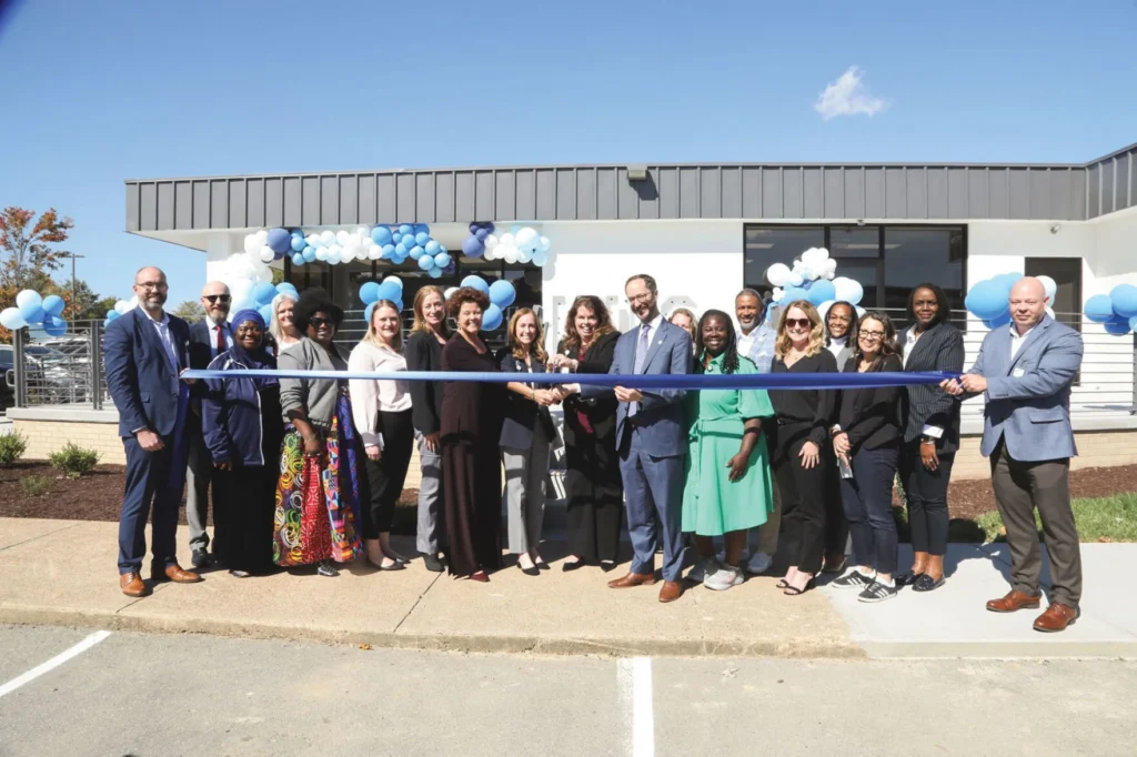 Mental Health Cooperative associates pose in front of new Children & Youth Crisis Stabilization center with Nashville mayor